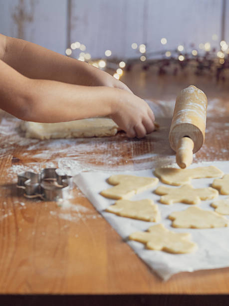 istock girl making Christmas cookies 2240049087