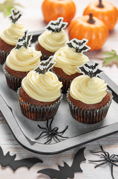 istock Halloween cupcakes decorated with bat and spider decorations 2240054385