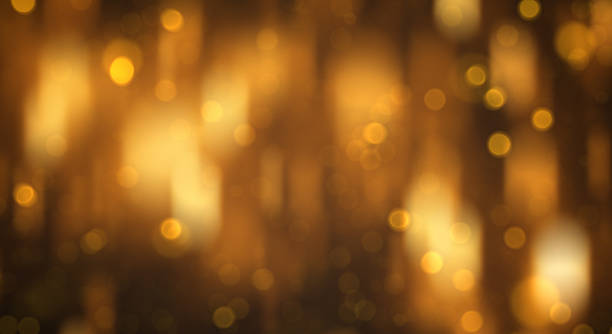 istock Golden Bokeh Lights Background 2240055799