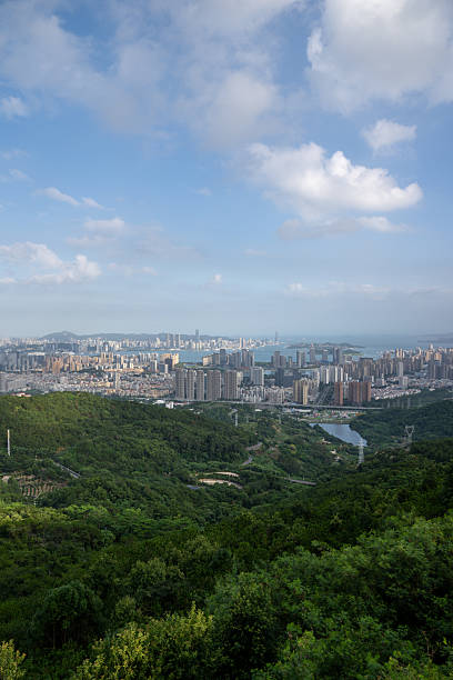 istock Harmony Between City and Nature: A Panoramic View of a Lush Urban Landscape from an Elevated Perspective 2240058029