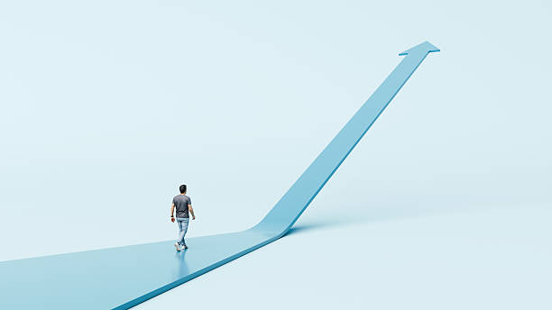 istock Man walking on upward arrow path toward growth, ambition, direction, progress, and success - 3d render 2240060913