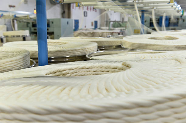 istock Cotton textile factory equipment is in operation 2240060974