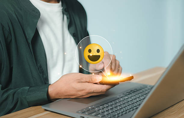 istock Customer using tablet give five star rating, Submit satisfaction survey through online application. Positive feedback highlight excellent service and product quality, improving brand reputation. 2240061672