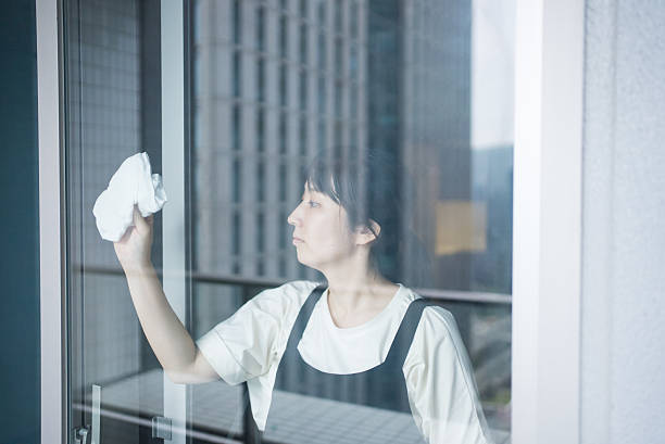 istock A Japanese woman in her 30s cleaning windows. 2240062849