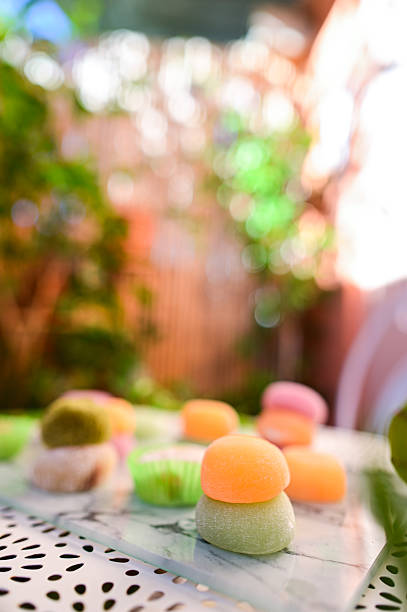 Colorful mochi ice cream dessert on outdoor table
