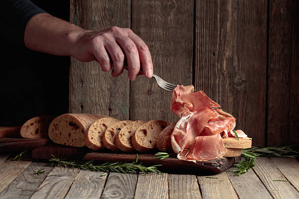istock The hand of a prosciutto thief. 2240063310