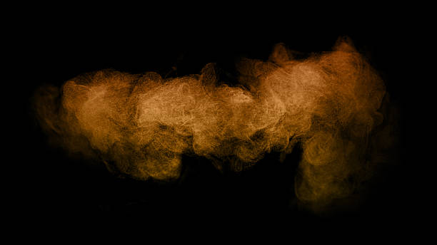 istock Orange dust cloud explosion isolated on black background. Abstract powder burst texture with vibrant glowing color for creative design, Halloween theme, smoke effect, or energy motion concept artwork. 2240065414