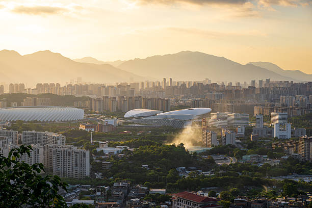 istock A Stunning Sunset View Over a Modern Cityscape with Prominent Architectural Structures and Distant Mountains 2240065971