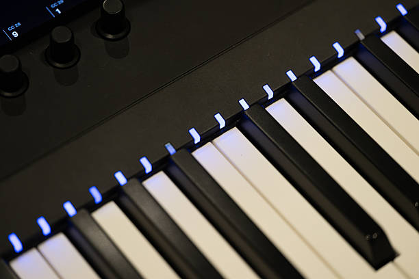 istock Close-up of a Digital Piano Keyboard with Illuminated Keys 2240066494