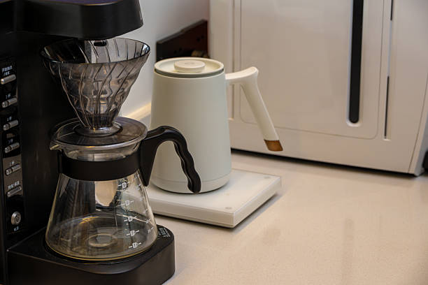 istock A Pour-Over Coffee Maker and Electric Kettle on a Kitchen Counter 2240066933