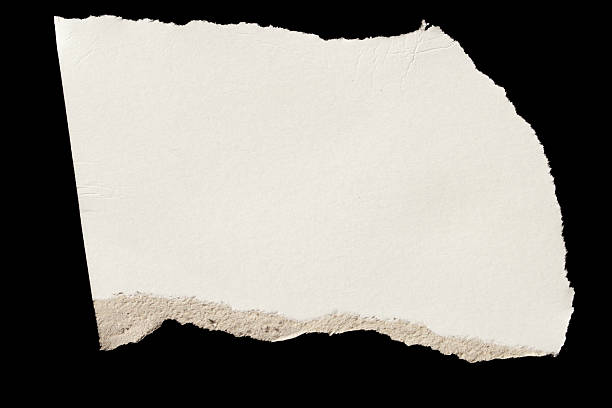 istock Ripped torn white paper piece on black background, paper tear 2240069467