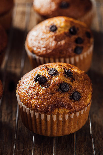 istock Freshly Baked Chocolate Chip Muffin on Cooling Rack Display 2240075190