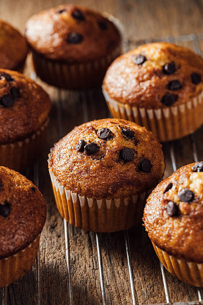 istock Homemade Chocolate Chip Muffins on Cooling Rack with Warm Glow 2240075269