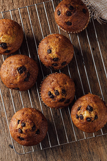 istock Delicious Chocolate Chip Muffins on Cooling Rack Freshly Baked 2240075287