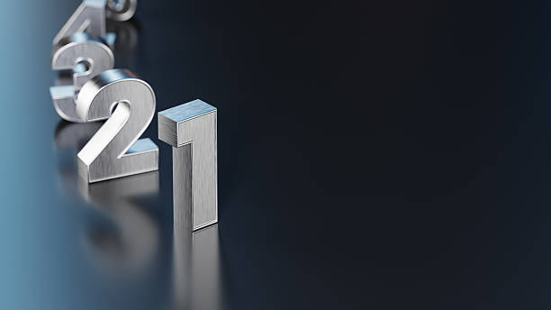 Three dimensional metallic numbers rest on a dark glossy surface, creating sharp reflections and a modern, professional feel. Ideal for year-end reports, finance, business, and countdown themes.