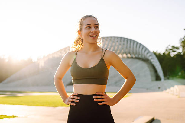 istock A young athlete trains in the sunset on a sports ground. 2240077420