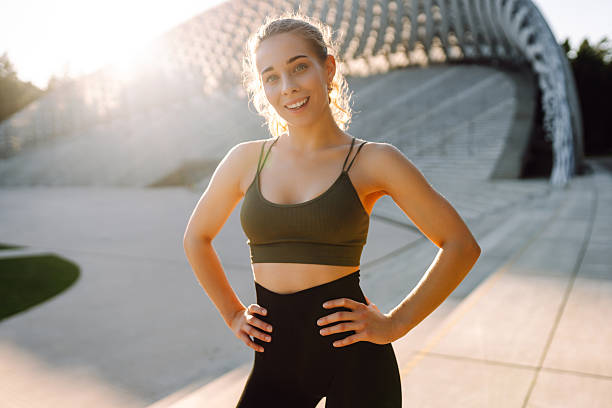 istock A young athlete trains in the sunset on a sports ground. 2240077423