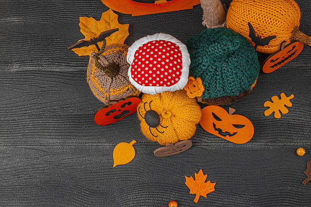 istock Dark Halloween atmospheric composition. Handmade knitted, crocheted, and sewn autumn decor 2240083066