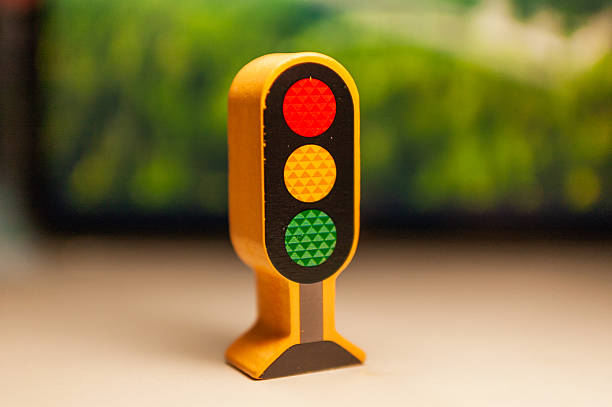 istock Traffic light model display urban setting miniature toy close-up view educational concept for kids 2240083143