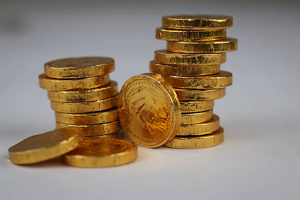 Gold coins stacked on each other in different positions isolated on white background.finance illustration.