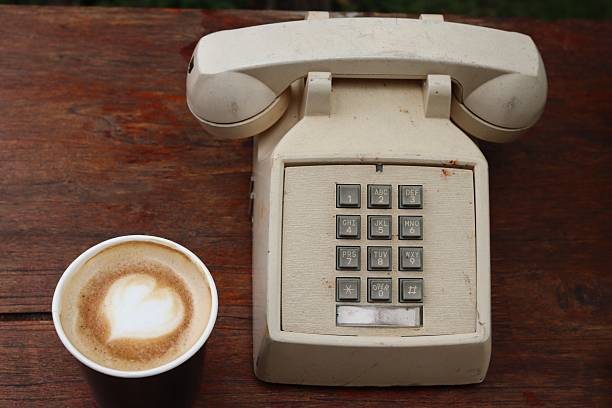 Vintage telephone with heart tatte art