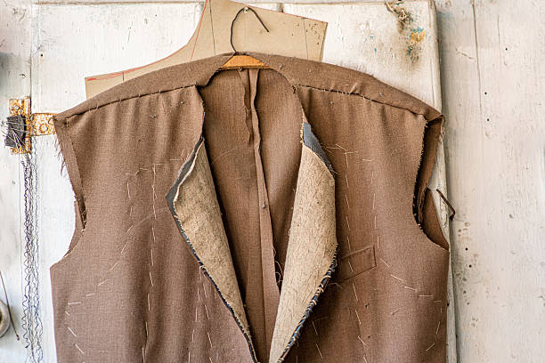 istock An unfinished jacket hanging on a tailor's wall 2240096275