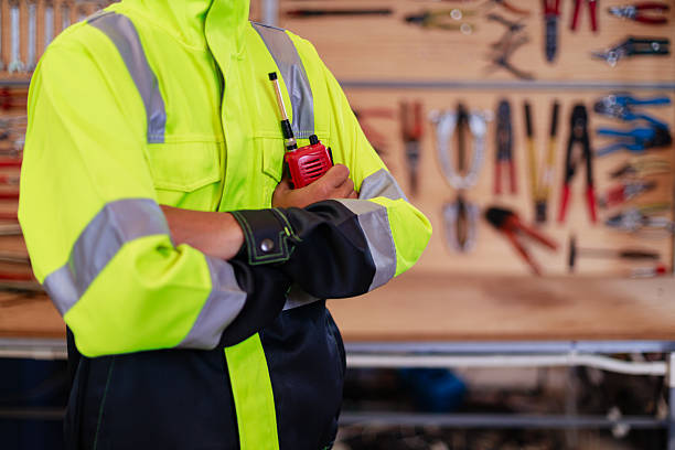 istock Engineer in high-visibility safety uniform using a laptop in an industrial workshop, showing integration of digital technology, factory tools, and modern engineering workflow in the workplace 2240101658