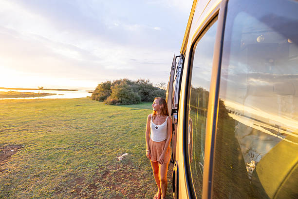 istock Sunset Serenity Beside Her Home on Wheels 2240105021