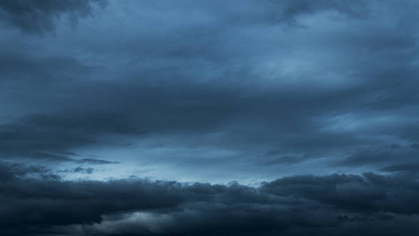 istock Sky full of dark stormy clouds 2240105939