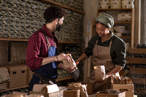 istock Two People Working Together in a Cozy Shop Environment 2240106138