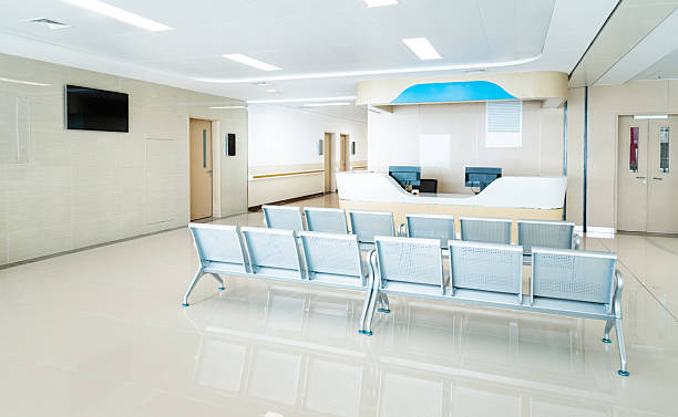 istock Hospital waiting room with many empty chairs 2240106183