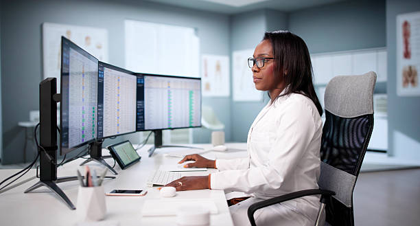 istock Confused Doctor Tries To Navigate New Software. 2240114112