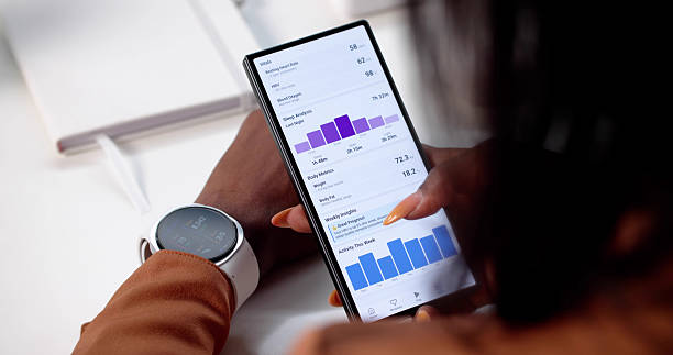 istock Monitoring Health Stats On Smart Fitness Tracker 2240115229
