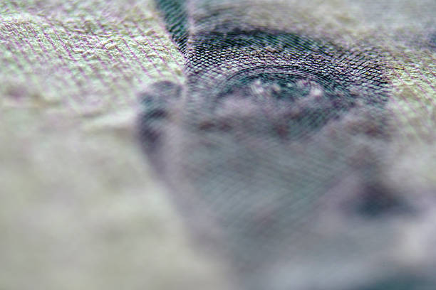istock Close-Up of Detailed Currency Texture and Intricate Design Elements 2240117127