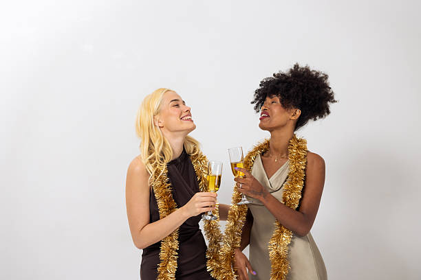 istock Two diverse women enjoying a festive celebration 2240117252