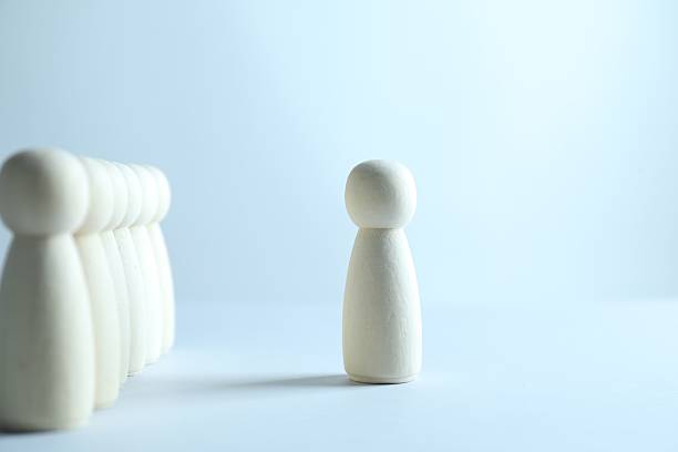 istock Human resources concept. Many wooden figures on light background, closeup 2240117597