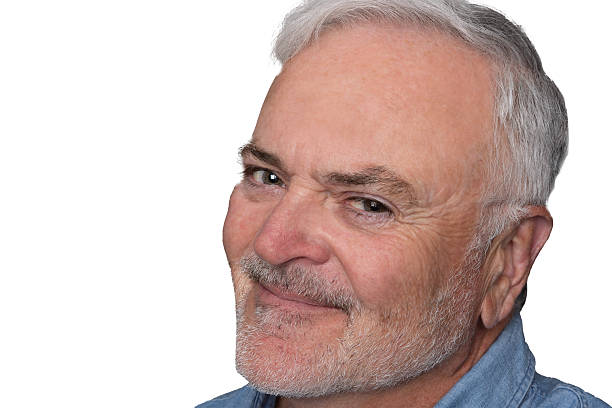 istock Studio portrait of smiling handsome senior man. 2240117775
