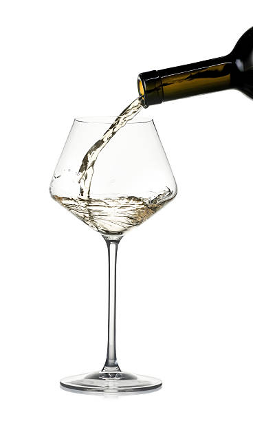 istock Pouring wine into glass on white background 2240122122