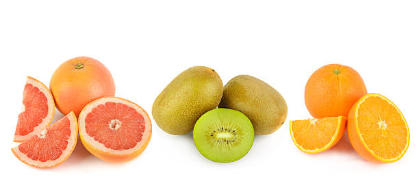 istock Fresh Grapefruits, Kiwis, and Oranges on White Background 2240124248