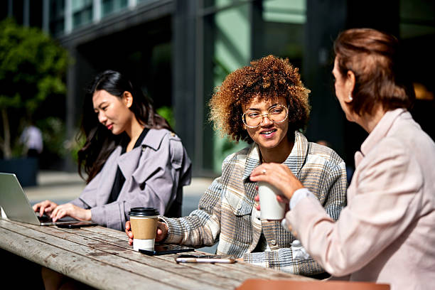 istock Business professionals enjoying coffee break, late summer 2240127540