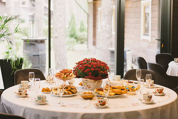 A beautiful table set for an autumn celebration. A concept for family gatherings, togetherness, and the cozy hygge lifestyle