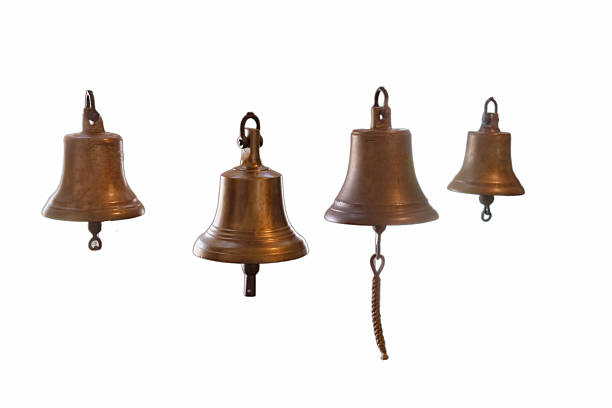 istock Decorative antique bells displayed in a row showcasing unique designs and craftsmanship in a vintage collection 2240133542