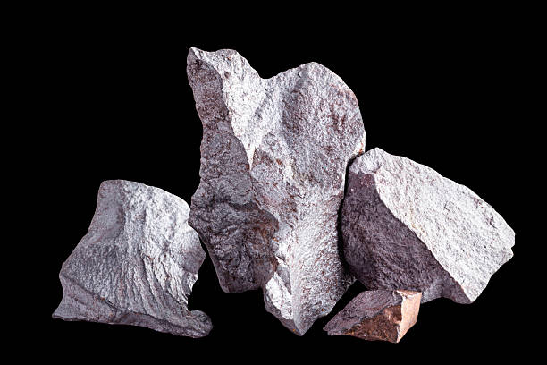istock Iron rock ore isolated on the black background. 2240139522