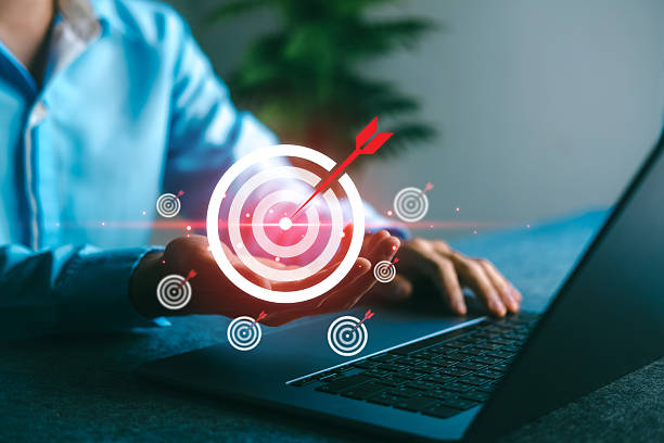 istock Business goal and success targeting concept with man holding digital target symbol, representing strategy, achievement, and precision planning in a modern business environment. 2240140761