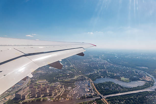 istock View from the airplane window during taking off on a clear summer morning 2240143404