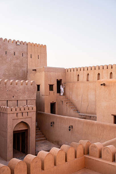 istock Woman exploring historic jabreen fort architecture in oman 2240146987
