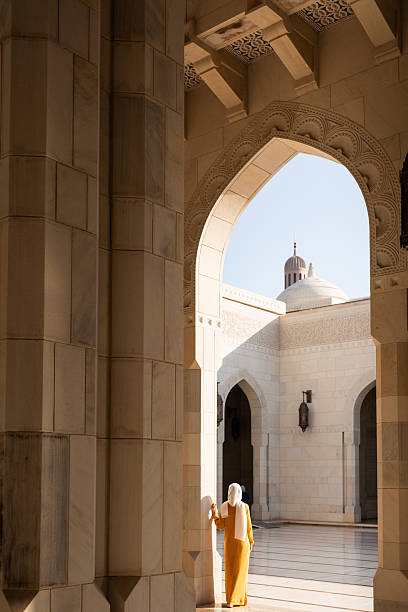 istock Woman exploring sultan qaboos grand mosque in oman 2240148024