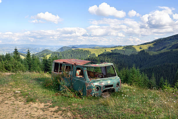 an old off-road car, a military and army car from the times of World War II, a monument, a classic. view of the lamp and mask