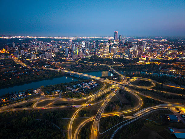 Aerial night view of Edmonton skyline with highway interchange, Alberta