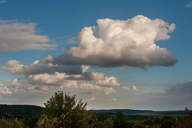 istock sky with cumulus clouds, space above a landscape 2240161065